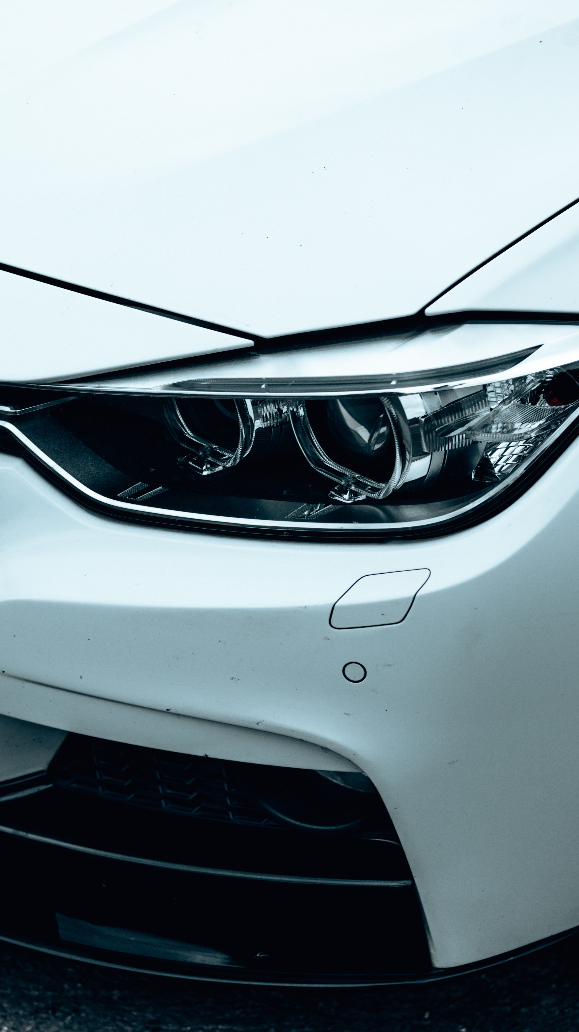 Headlight of a White Car 